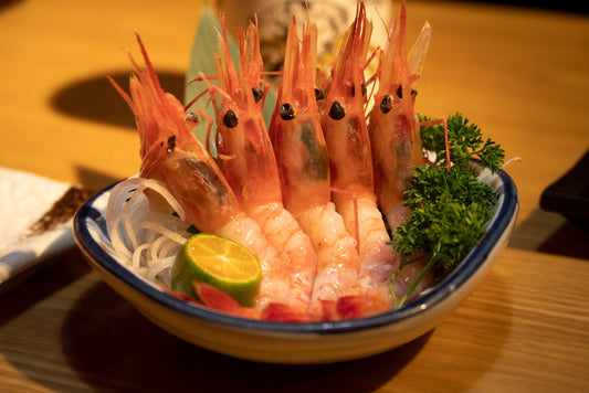 Fresh shrimp arranged in a stylish bowl.